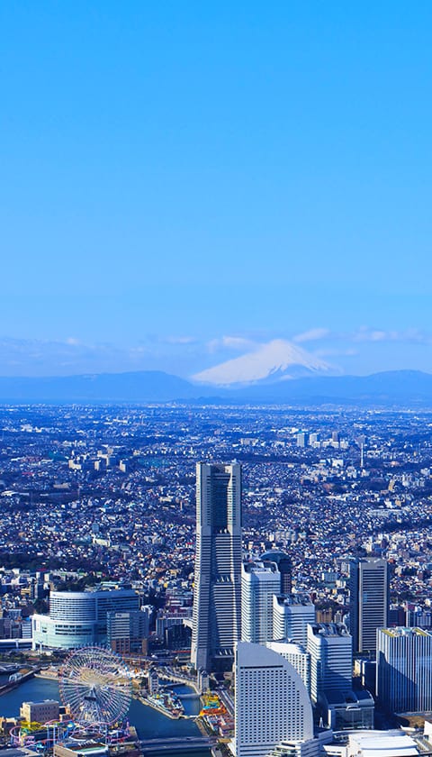 原状回復工事専門、株式会社ブルーム・ワークのイメージ画像、街と空の写真